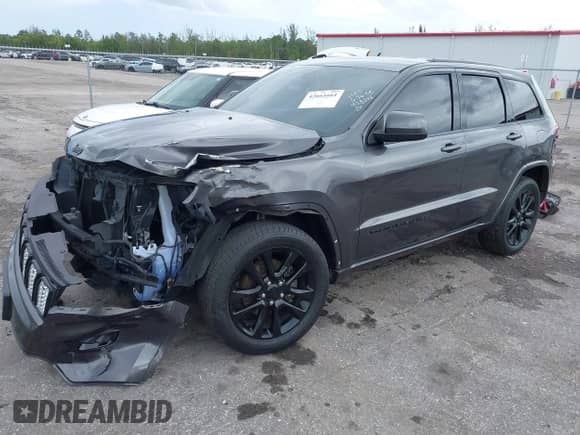 2018 Jeep Grand Cherokee Altitude with VIN 1C4RJEAG2JC428214, listed as a IAAI auction lot 42661661 with 81,859 mi miles and . Bid and sale history available at DreamBid. Image 2.