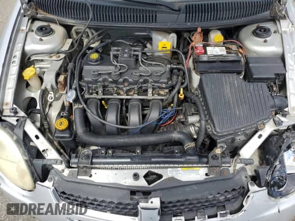 2003 Dodge Neon SE with VIN 1B3ES26C23D261772, listed as a Copart auction lot 70193335 with 181,827 mi miles and Salvage title. Bid and sale history available at DreamBid. Image 11.