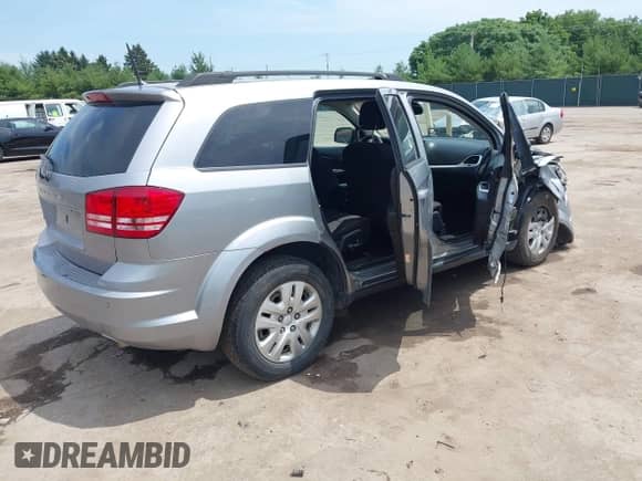 2020 Dodge Journey SE Value with VIN 3C4PDCABXLT237199, listed as a IAAI auction lot 42711626 with 145,090 mi miles and . Bid and sale history available at DreamBid. Image 4.