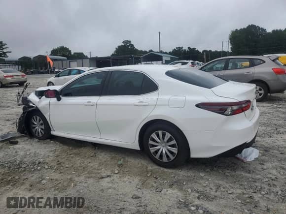 2024 Toyota Camry Hybrid LE z VIN 4T1H31AK5RU077576, wystawiony jako Copart lot #66674945 z przebiegiem 98 986 mil mil oraz Szkoda całkowita • Salvage title. Historia ofert i sprzedaży dostępna na DreamBid. Obrazek 2.