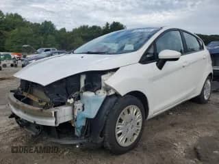 2015 Ford Fiesta S с VIN 3FADP4TJ7FM179738, выставлен на аукционе Copart как лот 84215285 с пробегом 71 837 миль миль и Чистый • Clean title. История ставок и продаж доступна на DreamBid. Изображение 1.