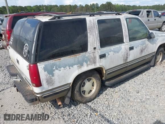 1999 Chevrolet Tahoe with VIN 1GNEC13R3XJ539270, listed as a IAAI auction lot 41972014 with 264,619 mi miles and . Bid and sale history available at DreamBid. Image 4.