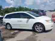 2012 Honda Odyssey Touring с VIN 5FNRL5H99CB115300, выставлен на аукционе IAAI как лот 42890660 с пробегом 120 808 миль миль и . История ставок и продаж доступна на DreamBid. Изображение 13.