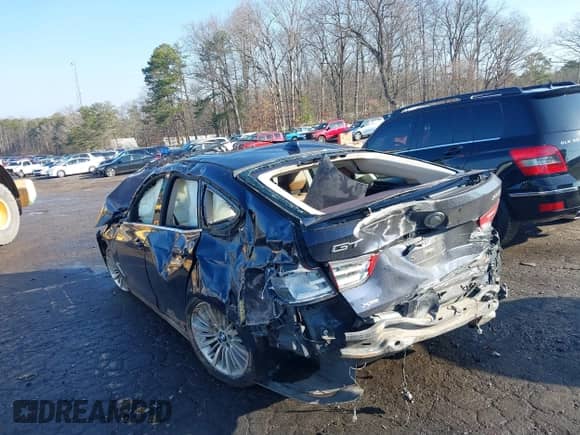 2014 BMW 3 Series 335i Gran Turismo xDrive z VIN WBA3X9C50ED153043, wystawiony jako IAAI lot #41522427 z przebiegiem 186 028 mil mil oraz . Historia ofert i sprzedaży dostępna na DreamBid. Obrazek 3.