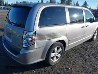 2013 Dodge Grand Caravan SE with VIN 2C4RDGBG6DR703399, listed as a IAAI auction lot 43230305 with 113,048 mi miles and . Bid and sale history available at DreamBid. Image 4.