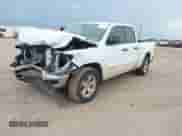 2023 Ram 1500 Big Horn with VIN 1C6RRFBG4PN599435, listed as a IAAI auction lot 42394418 with 25,489 mi miles and . Bid and sale history available at DreamBid. Image 2.