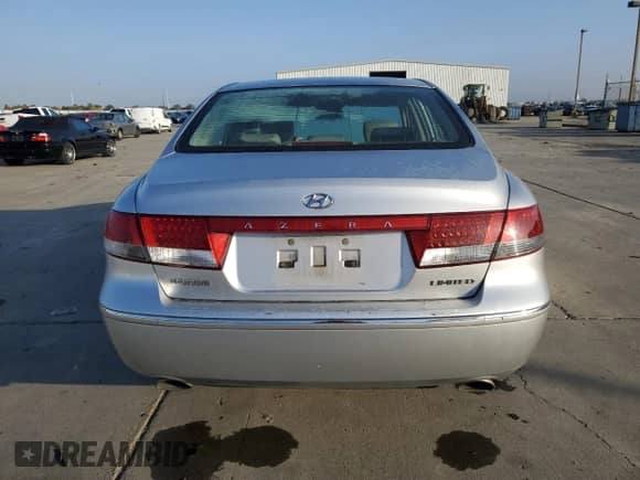 2007 Hyundai Azera SE z VIN KMHFC46F67A179939, wystawiony jako Copart lot #82668965 z przebiegiem 213 551 mil mil oraz Szkoda całkowita • Salvage title. Historia ofert i sprzedaży dostępna na DreamBid. Obrazek 6.