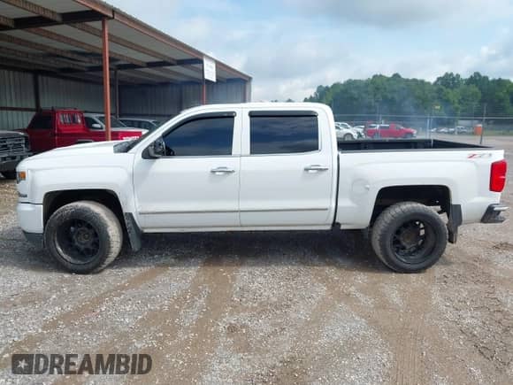 2017 Chevrolet Silverado 1500 LTZ z VIN 3GCUKSEJ3HG127857, wystawiony jako IAAI lot #42887256 z przebiegiem 191 237 mil mil oraz . Historia ofert i sprzedaży dostępna na DreamBid. Obrazek 14.