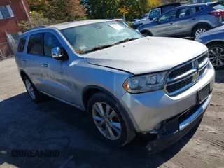 2011 Dodge Durango Crew with VIN 1D4RE4GG2BC674450, listed as a IAAI auction lot 43363776 with 156,404 mi miles and . Bid and sale history available at DreamBid. Image 1.