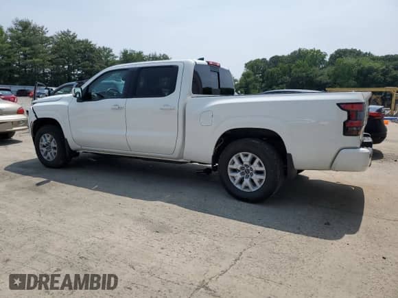 2023 Nissan Frontier SV with VIN 1N6ED1FK9PN653056, listed as a Copart auction lot 57102365 with 27,454 mi miles and Salvage title. Bid and sale history available at DreamBid. Image 2.