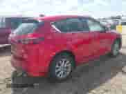 2024 Mazda CX-5 S Select z VIN JM3KFBBLXR0437485, wystawiony jako IAAI lot #43252664 z przebiegiem 30 475 mil mil oraz . Historia ofert i sprzedaży dostępna na DreamBid. Obrazek 4.