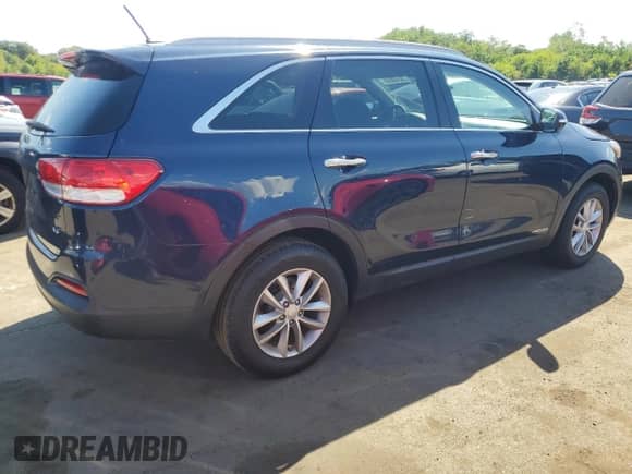 2018 Kia Sorento LX z VIN 5XYPGDA56JG419042, wystawiony jako Copart lot #70549065 z przebiegiem 143 064 mil mil oraz Szkoda całkowita • Salvage title. Historia ofert i sprzedaży dostępna na DreamBid. Obrazek 3.