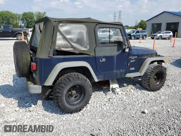2000 Jeep Wrangler Sport with VIN 1J4FA49S5YP744967, listed as a Copart auction lot 67909665 with 141,990 mi miles and Clean title. Bid and sale history available at DreamBid. Image 3.
