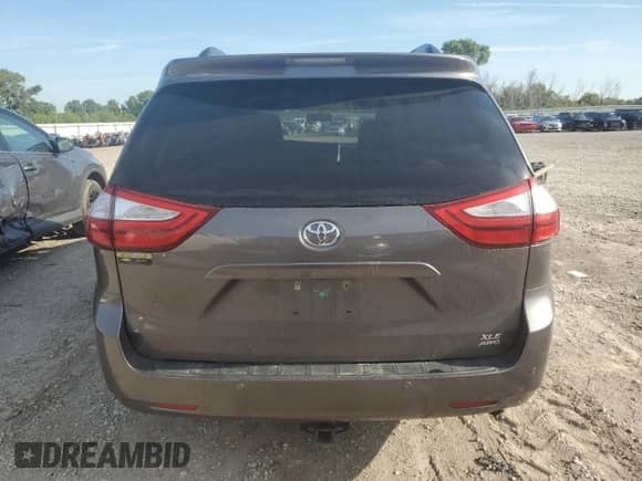 2015 Toyota Sienna Limited с VIN 5TDDK3DC2FS094437, выставлен на аукционе Copart как лот 70261915 с пробегом 211 627 миль миль и Списание • Salvage title. История ставок и продаж доступна на DreamBid. Изображение 6.