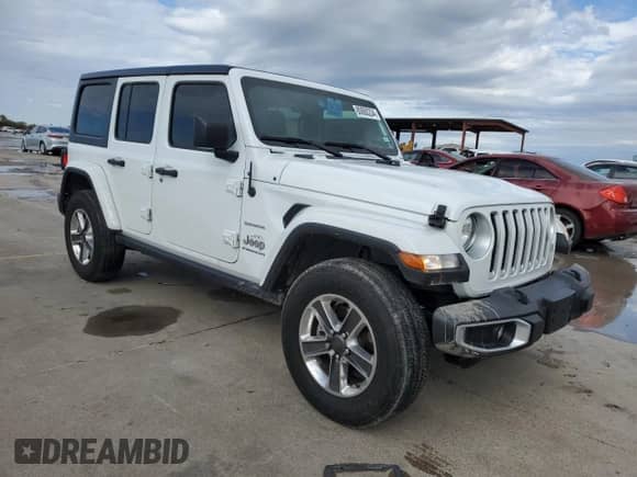 2023 Jeep Wrangler Sahara Altitude with VIN 1C4HJXEG5PW570629, listed as a Copart auction lot 80860234 with 15,121 mi miles and Salvage title. Bid and sale history available at DreamBid. Image 4.