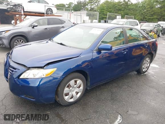 2007 Toyota Camry XLE z VIN 4T1BK46K57U039216, wystawiony jako IAAI lot #42674920 z przebiegiem 97 318 mil mil oraz . Historia ofert i sprzedaży dostępna na DreamBid. Obrazek 2.