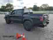 2025 Nissan Frontier Pro-4X with VIN 1N6ED1EK2SN614030, listed as a Copart auction lot 72075145 with 11,629 mi miles and Salvage title. Bid and sale history available at DreamBid. Image 2.