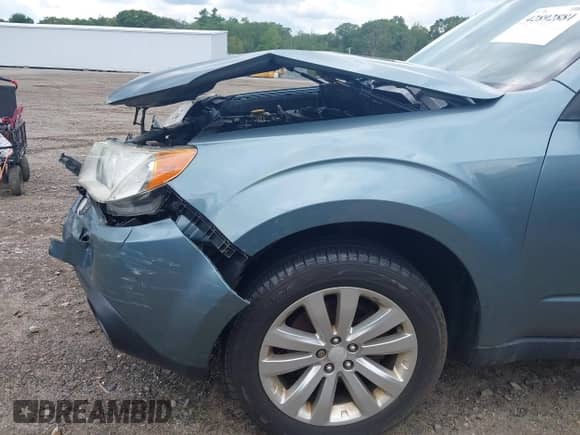 2012 Subaru Forester X Limited z VIN JF2SHAEC9CH422804, wystawiony jako IAAI lot #42892881 z przebiegiem 141 716 mil mil oraz . Historia ofert i sprzedaży dostępna na DreamBid. Obrazek 12.