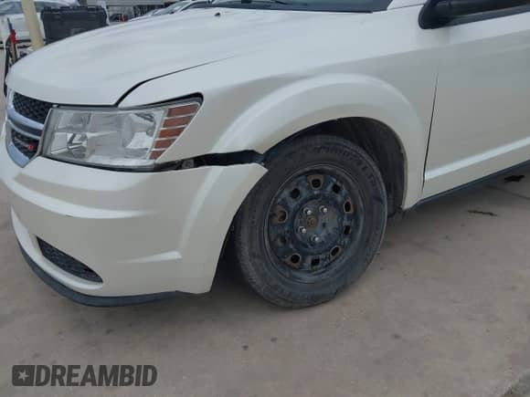 2014 Dodge Journey American Value with VIN 3C4PDCABXET101139, listed as a IAAI auction lot 42623417 with 151,744 mi miles and . Bid and sale history available at DreamBid. Image 6.