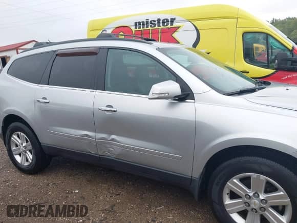 2014 Chevrolet Traverse LT с VIN 1GNKRHKD0EJ292318, выставлен на аукционе IAAI как лот 43299923 с пробегом 135 449 миль миль и . История ставок и продаж доступна на DreamBid. Изображение 13.