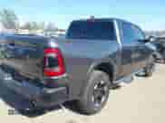 2022 Ram 1500 Rebel z VIN 1C6SRFLT4NN177112, wystawiony jako IAAI lot #42402050 z przebiegiem 26 239 mil mil oraz . Historia ofert i sprzedaży dostępna na DreamBid. Obrazek 4.