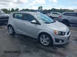2015 Chevrolet Sonic LTZ with VIN 1G1JE6SB2F4103387, listed as a IAAI auction lot 43400010 with 74,902 mi miles and . Bid and sale history available at DreamBid. Image 1.