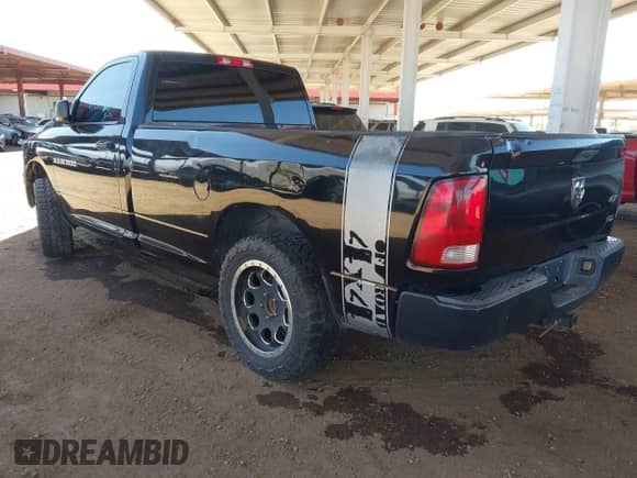 2012 Ram 1500 z VIN 3C6JD7DPXCG259725, wystawiony jako IAAI lot #42409076 z przebiegiem 186 458 mil mil oraz . Historia ofert i sprzedaży dostępna na DreamBid. Obrazek 3.