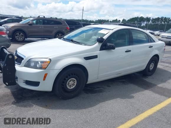 2014 Chevrolet Caprice Police Police with VIN 6G3NS5U27EL950499, listed as a IAAI auction lot 43005714 with 116,591 mi miles and . Bid and sale history available at DreamBid. Image 2.