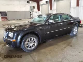 2008 Chrysler 300 C with VIN 2C3LK63H18H270636, listed as a Copart auction lot 65391535 with 165,785 mi miles and Salvage title. Bid and sale history available at DreamBid. Image 1.