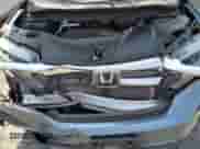 2020 Honda Pilot EX z VIN 5FNYF5H39LB021562, wystawiony jako Copart lot #68876835 z przebiegiem 68 836 mil mil oraz Szkoda całkowita • Salvage title. Historia ofert i sprzedaży dostępna na DreamBid. Obrazek 12.