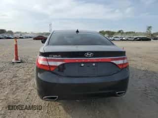 2014 Hyundai Azera с VIN KMHFG4JG7EA414236, выставлен на аукционе Copart как лот 71658544 с пробегом 143 404 миль миль и Списание • Salvage title. История ставок и продаж доступна на DreamBid. Изображение 6.