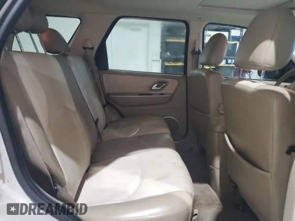 2007 Mercury Mariner Premier with VIN 4M2CU971X7KJ11281, listed as a Copart auction lot 70717105 with 149,938 mi miles and Salvage title. Bid and sale history available at DreamBid. Image 11.