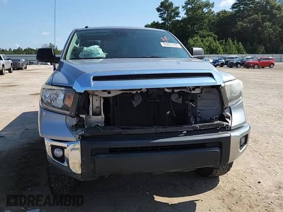 2019 Toyota Tundra SR с VIN 5TFRM5F12KX143986, выставлен на аукционе Copart как лот 69851445 с пробегом 142 082 миль миль и Списание • Salvage title. История ставок и продаж доступна на DreamBid. Изображение 14.
