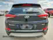 2018 Hyundai Tucson Sport with VIN KM8J33AL3JU744042, listed as a Copart auction lot 85325385 with 104,499 mi miles and Salvage title. Bid and sale history available at DreamBid. Image 6.