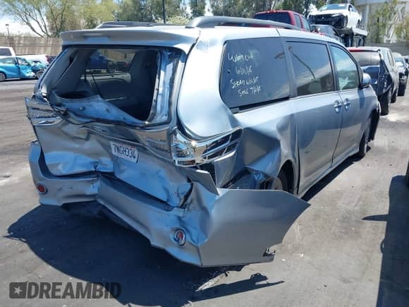 2014 Toyota Sienna SE with VIN 5TDXK3DC8ES417109, listed as a IAAI auction lot 42623735 with 96,234 mi miles and . Bid and sale history available at DreamBid. Image 4.