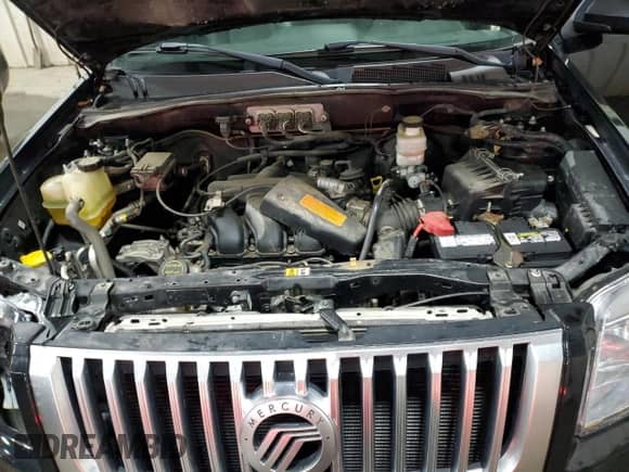 2008 Mercury Mariner Premier with VIN 4M2CU97158KJ36462, listed as a Copart auction lot 85297144 with 187,819 mi miles and Salvage title. Bid and sale history available at DreamBid. Image 12.