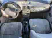 1999 Saturn SL z VIN 1G8ZF5281XZ150740, wystawiony jako Copart lot #86926374 z przebiegiem 170 051 mil mil oraz Czysty tytuł • Clean title. Historia ofert i sprzedaży dostępna na DreamBid. Obrazek 8.