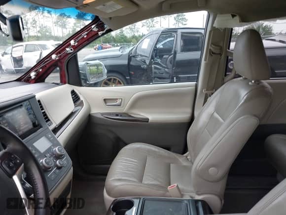2016 Toyota Sienna XLE with VIN 5TDYK3DCXGS747888, listed as a IAAI auction lot 42941019 with 188,604 mi miles and . Bid and sale history available at DreamBid. Image 5.