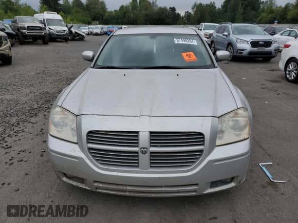 2005 Dodge Magnum SE with VIN 2D4FV48V65H683993, listed as a Copart auction lot 67498284 with 164,931 mi miles and Salvage title. Bid and sale history available at DreamBid. Image 5.