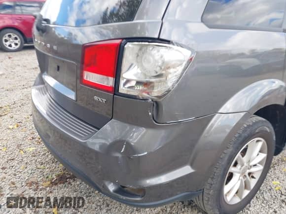 2013 Dodge Journey SXT with VIN 3C4PDCBB7DT502712, listed as a IAAI auction lot 43497552 with 157,495 mi miles and . Bid and sale history available at DreamBid. Image 15.