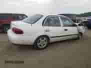 2000 Chevrolet Prizm с VIN 1Y1SK5281YZ415530, выставлен на аукционе Copart как лот 60704824 с пробегом Не указан миль и Списание • Salvage title. История ставок и продаж доступна на DreamBid. Изображение 3.