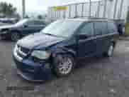 2013 Dodge Grand Caravan SXT with VIN 2C4RDGCG8DR654835, listed as a IAAI auction lot 43434902 with 167,017 mi miles and . Bid and sale history available at DreamBid. Image 2.