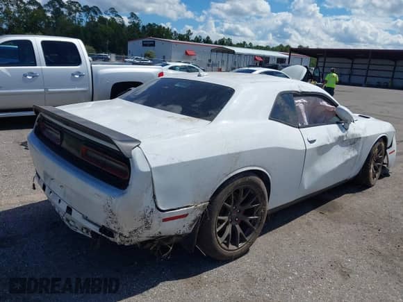 2016 Dodge Challenger SRT Hellcat with VIN 2C3CDZC98GH344394, listed as a IAAI auction lot 43309335 with 64,278 mi miles and . Bid and sale history available at DreamBid. Image 4.