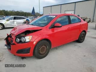 2015 Chevrolet Sonic LS with VIN 1G1JB5SG7F4165642, listed as a Copart auction lot 88671595 with 57,794 mi miles and Salvage title. Bid and sale history available at DreamBid. Image 1.
