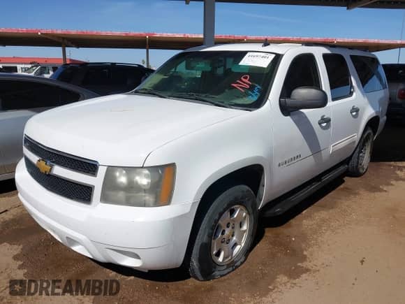 2010 Chevrolet Suburban LS with VIN 1GNUCHE01AR174986, listed as a IAAI auction lot 41697401 with 333,135 mi miles and . Bid and sale history available at DreamBid. Image 2.