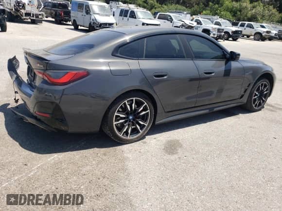 2024 BMW i4 M50 with VIN WBY33AW07RFR67375, listed as a Copart auction lot 62232485 with 19,819 mi miles and Salvage title. Bid and sale history available at DreamBid. Image 3.