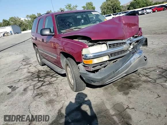 2004 Chevrolet Tahoe LS with VIN 1GNEC13T44R294049, listed as a Copart auction lot 59900565 with 149,379 mi miles and Salvage title. Bid and sale history available at DreamBid. Image 14.