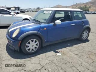 2004 MINI Hardtop with VIN WMWRC334X4TC51451, listed as a Copart auction lot 61268235 with 149,750 mi miles and Salvage title. Bid and sale history available at DreamBid. Image 1.