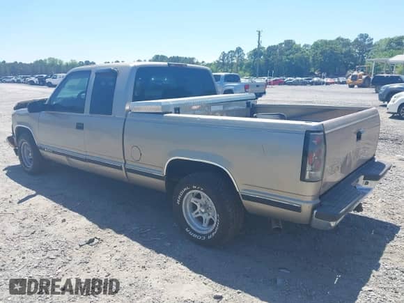 1999 Chevrolet Silverado 1500 with VIN 1GCEC19M5XR124635, listed as a IAAI auction lot 42053209 with 256,735 mi miles and . Bid and sale history available at DreamBid. Image 3.
