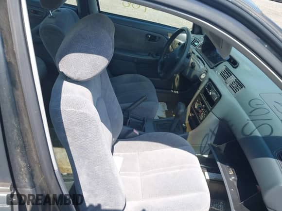 1997 Toyota Camry LE z VIN 4T1BF22K7VU021327, wystawiony jako IAAI lot #42666914 z przebiegiem Nie podano mil oraz . Historia ofert i sprzedaży dostępna na DreamBid. Obrazek 5.